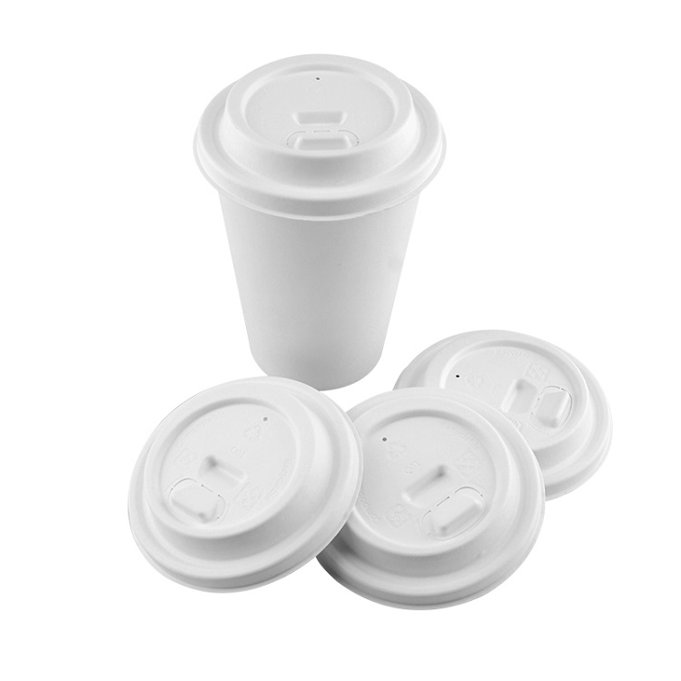 What material is the paper cup with cover made of?